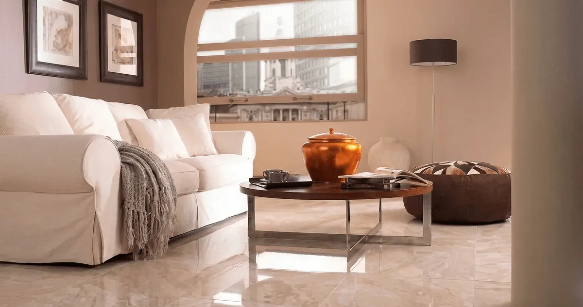 Modern living room with professionally installed marble flooring, a beige sofa, coffee table in Ogden, UT